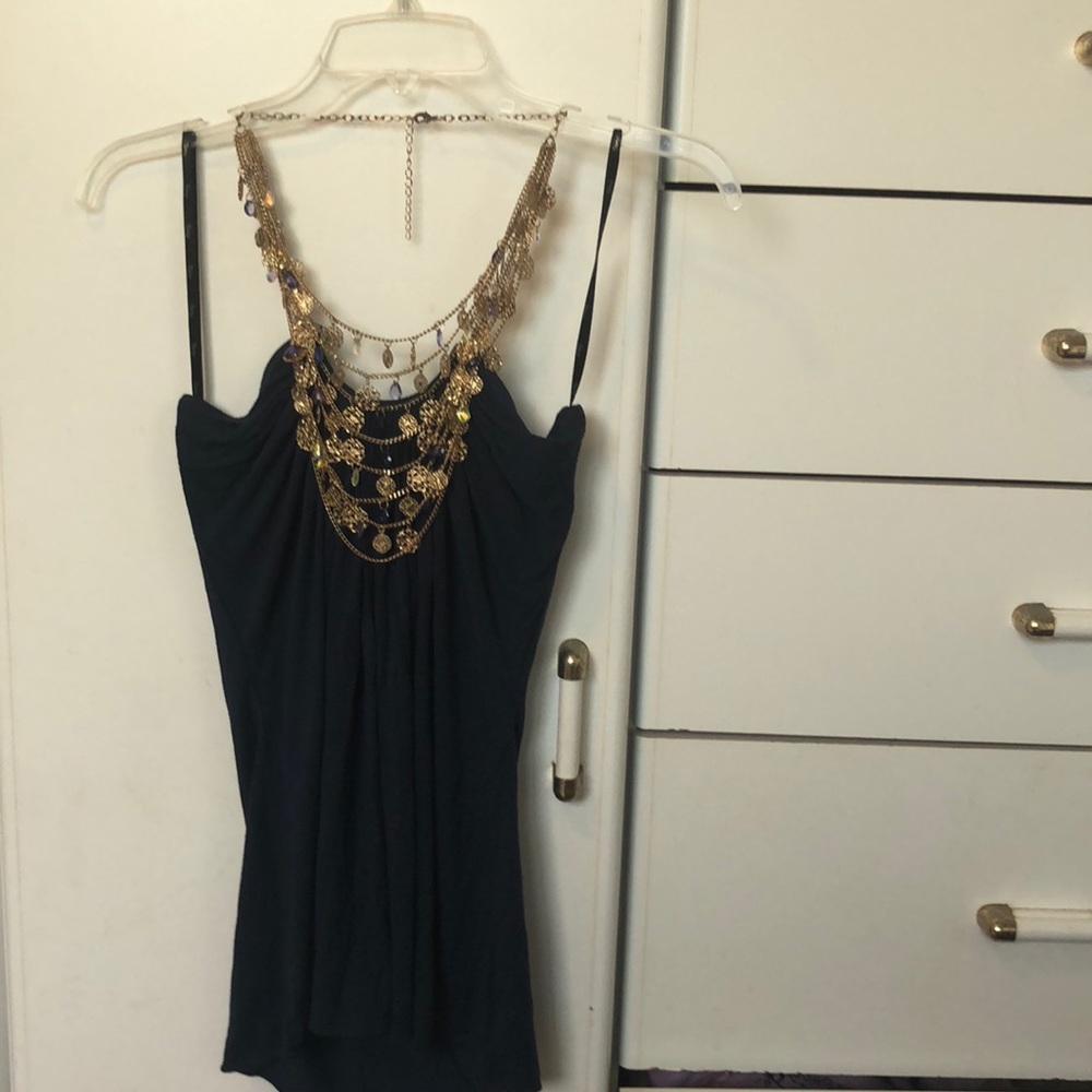 Sky top with attached chains on neckline